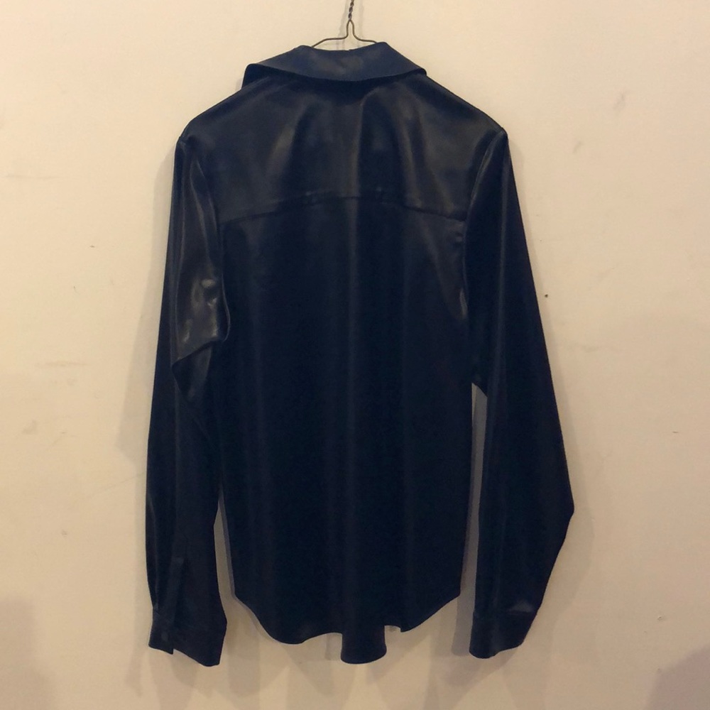 Danielle Romero’s waterproof button down jacket. - Picture 2 of 3